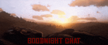 a sunset with the words goodnight chat in red letters