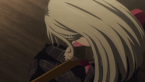 a girl with long blonde hair is holding a wooden stick in her hand