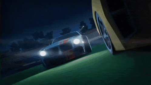 a yellow car with red lights on the back is driving on a track