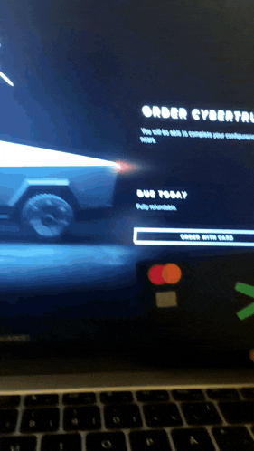 a computer screen shows a car and the words order cybertruck