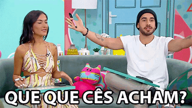 a man and a woman are sitting on a couch with the words que que ces acham written on the bottom