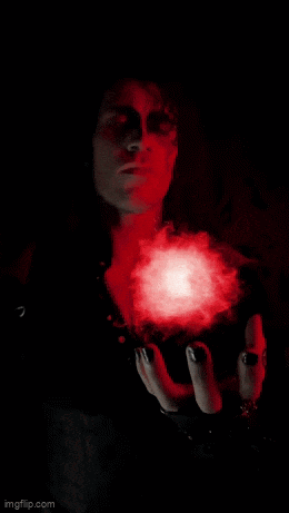 a woman holding a red heart in her hands