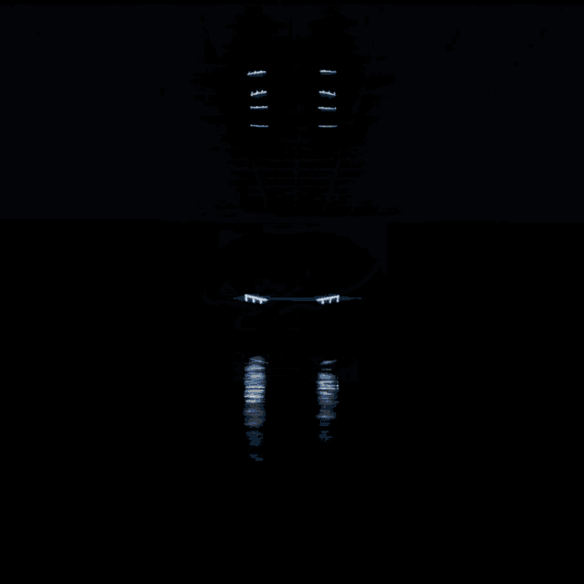 a car 's headlights are shining in the dark