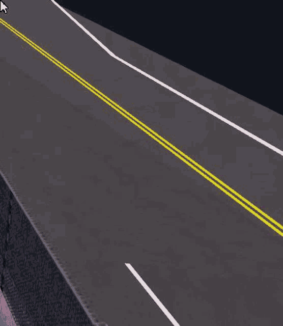 a group of race cars are driving down a race track .