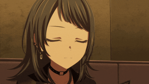 a girl with black hair and green eyes is wearing a choker around her neck