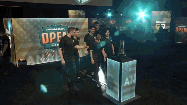 a group of people are standing in front of a sign that says open