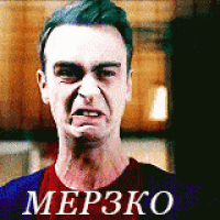 a man in a red shirt is making a funny face with the word merzko written on the bottom