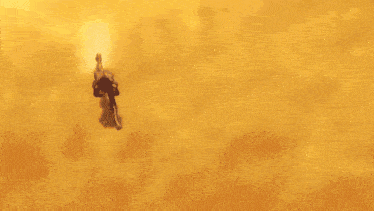 a person is flying through the air while another person throws a fireball