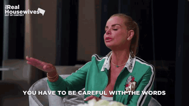 a woman in a green jacket with the words " you have to be careful with the words " on the bottom