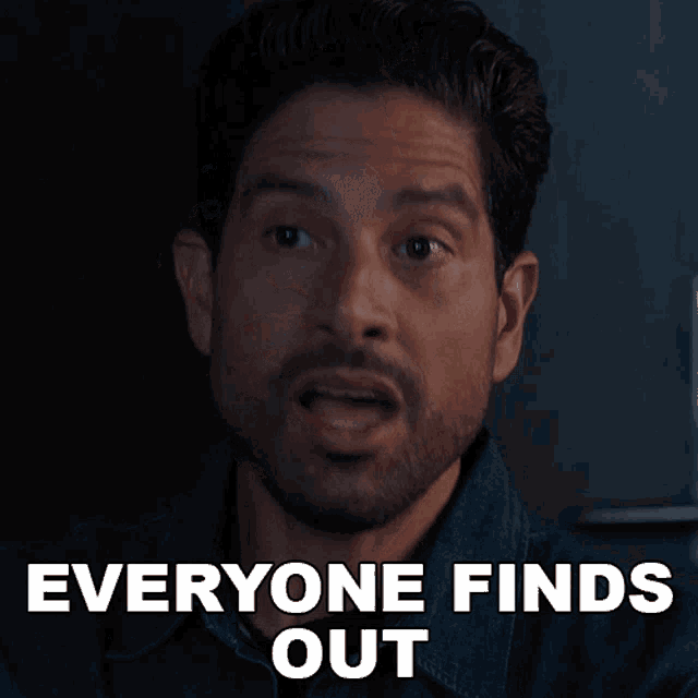 a man with a beard says everyone finds out in white letters