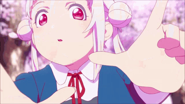 a girl with white hair and red eyes is making a thumbs up gesture
