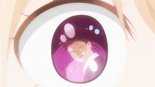 a close up of a person 's eye with a purple circle in the middle
