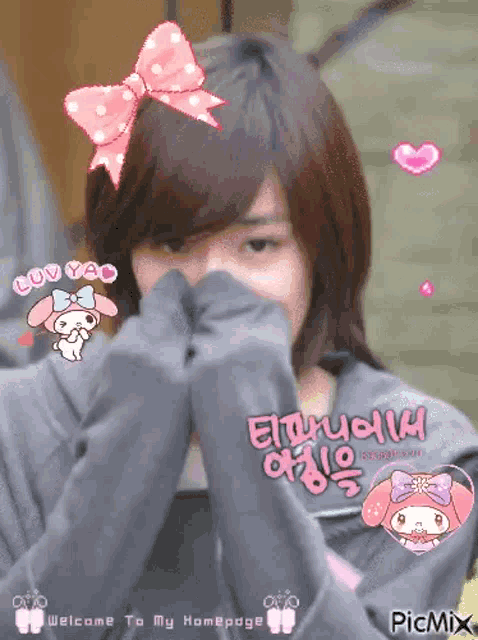 a picture of a girl with a pink bow on her head and the words love you
