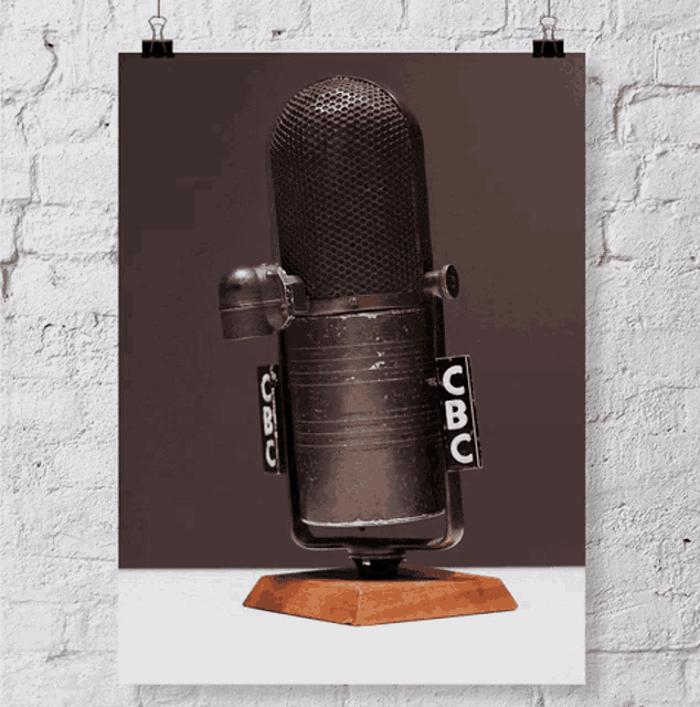 a poster of a microphone with the letters cb on it