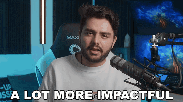 a man in front of a microphone with the words a lot more impactful above him