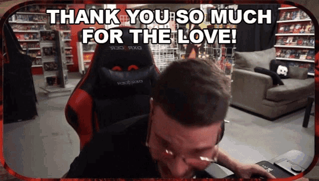 a man sitting in a gaming chair says thank you so much for the love