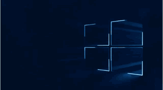 a computer screen with a blue windows logo on it