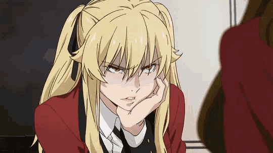 a girl with blonde hair and a red jacket has her hand on her face