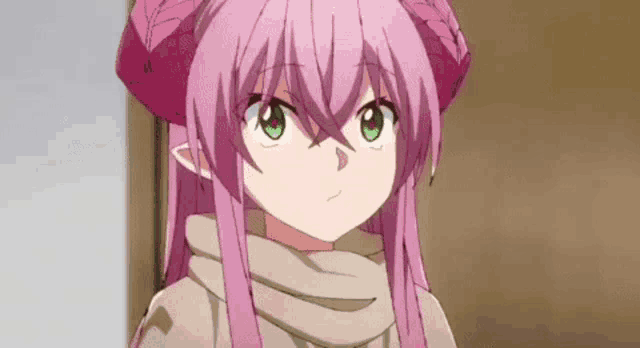 a girl with pink hair and green eyes is wearing a scarf .