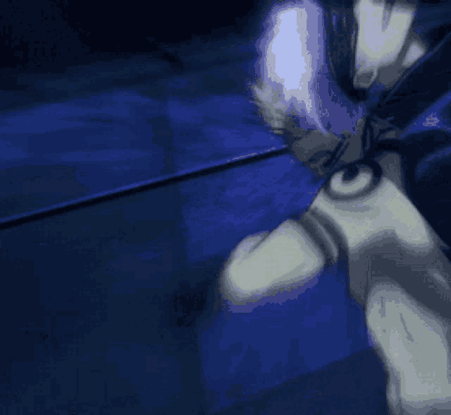 a man with a tattoo on his back is running in the dark