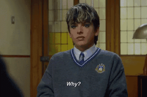 a young man in a school uniform is asking why