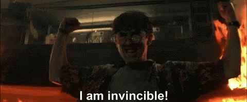 I Am Invincible! GIF - Invincible Alan Cumming Fire GIFs