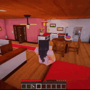 a girl is playing a video game in a house