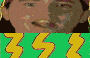 a close up of a man 's face with a yellow lightning bolt on the bottom