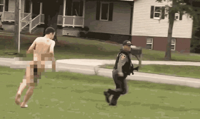 a naked man is being chased by a police officer who is wearing a hat with the letter o on it
