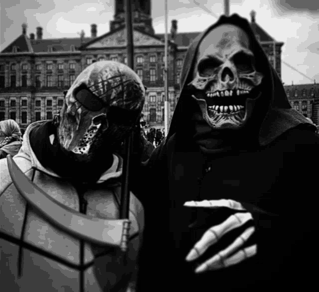 a grim reaper stands next to a skeleton
