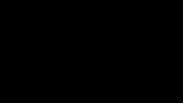 two people riding motorcycles on a road with a tree in the background and the words cycle world on the bottom