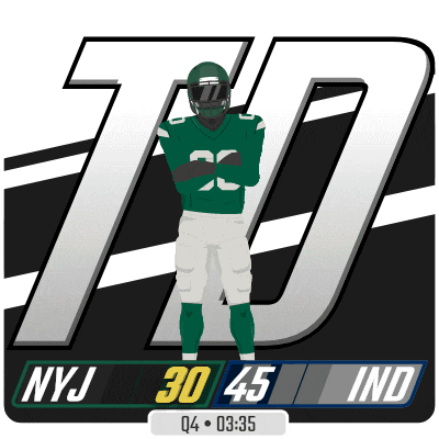 a new york jets football player is standing in front of a scoreboard