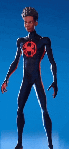 a man in a black suit with a red spider on his chest is standing in front of a blue background