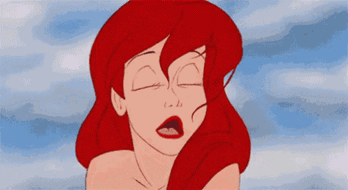 ariel from the little mermaid is making a funny face with her eyes closed and her mouth open .