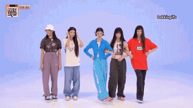 a group of girls are standing next to each other with their hands on their hips in front of a blue background that says new tips