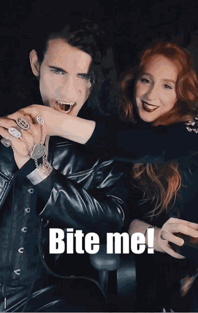 a picture of a man biting a woman 's hand with the words bite me below it