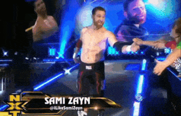 a shirtless wrestler named sami zayn is walking down the aisle