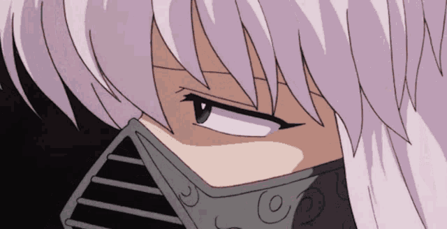 a close up of a girl 's face with a mask on