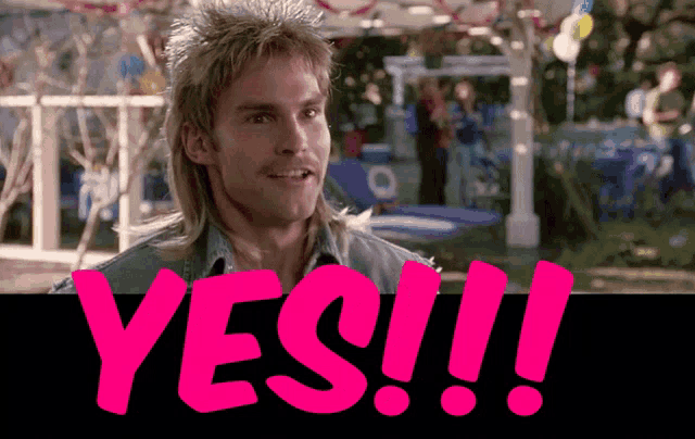 a man with a mullet and the word yes in pink