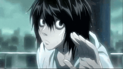 a close up of a person 's face with a hand outstretched