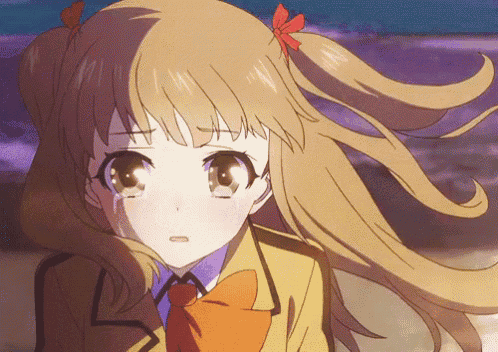 a girl in a school uniform with a red bow on her hair