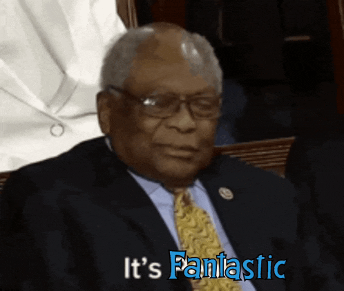 a man in a suit and tie says it 's fantastic in blue letters