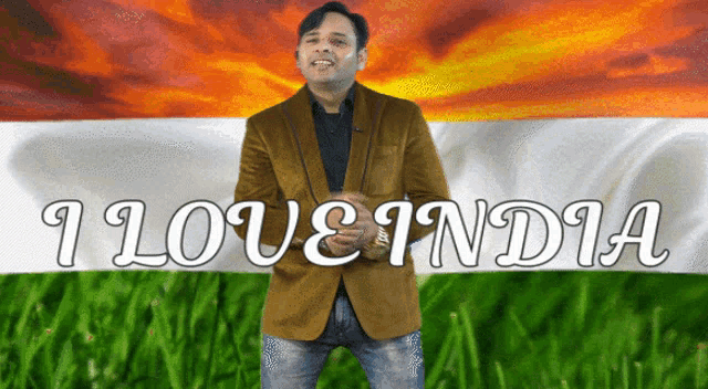 a man standing in front of a flag with the words i love india on it