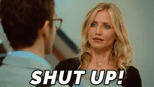 a woman talking to a man with the words shut up written on the screen