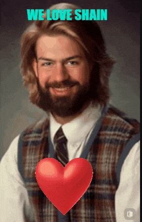a man in a plaid vest and tie with a red heart and the words we love shain above him