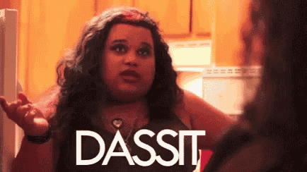 a woman is standing in front of a refrigerator with the word dassit written on the bottom