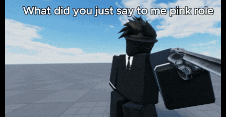 a video game character holding a gun with the words what did you just say to me pink role below him