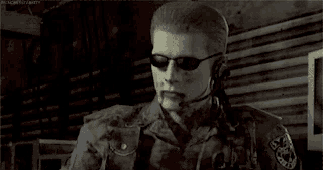 a man is wearing sunglasses and a headset while holding a bottle .