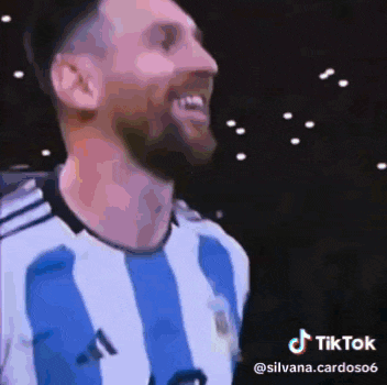 a man in a blue and white striped shirt with the number 11 on the front