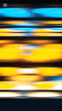 blue and yellow lines on a black background with the letter x in the middle